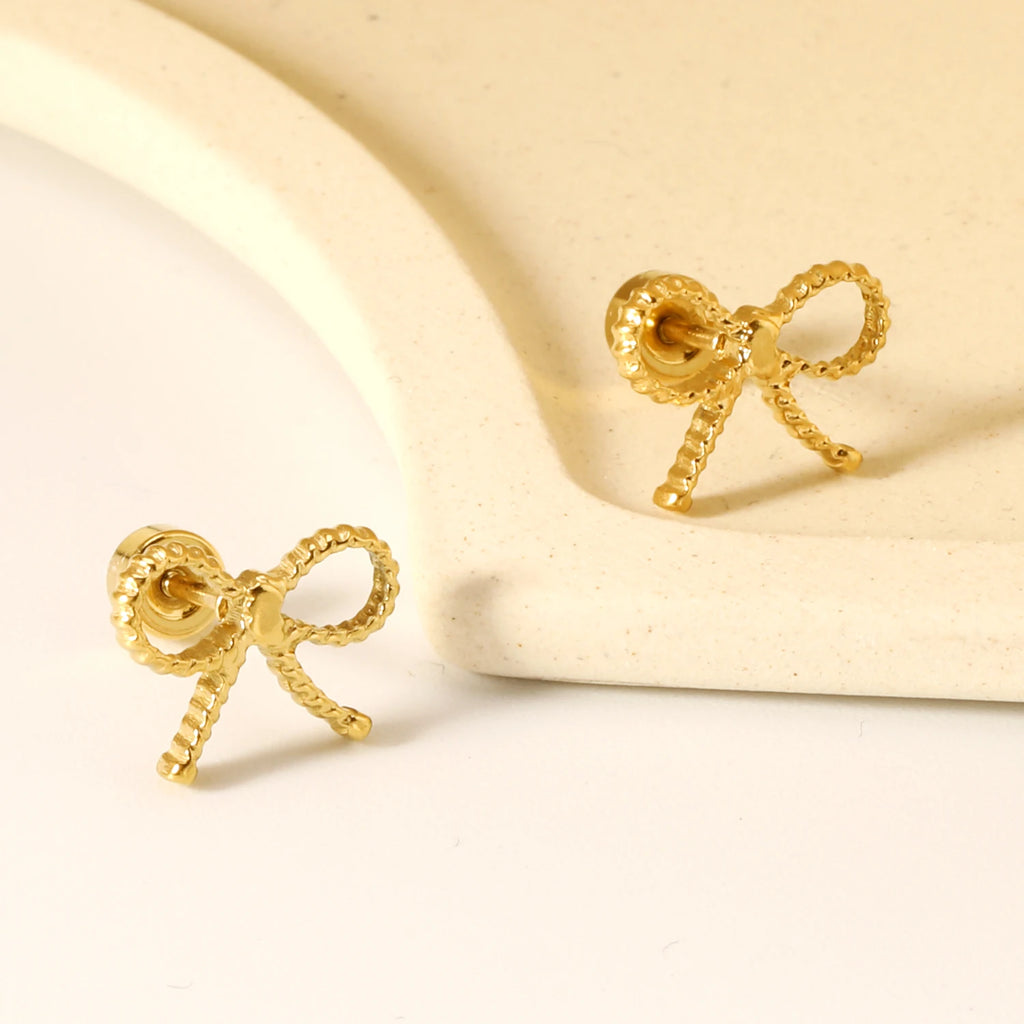 LUXUKISSKIDS Sets aus Ohrringen, Anhängern und Halsketten mit Schleifenmotiv aus Chirurgenstahl als Geschenk.