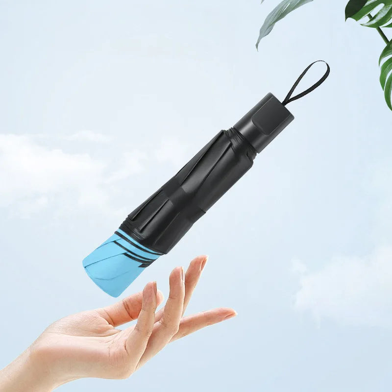 Tragbarer faltbarer Mini-Sonnenschirm mit UV-Schutz 50+